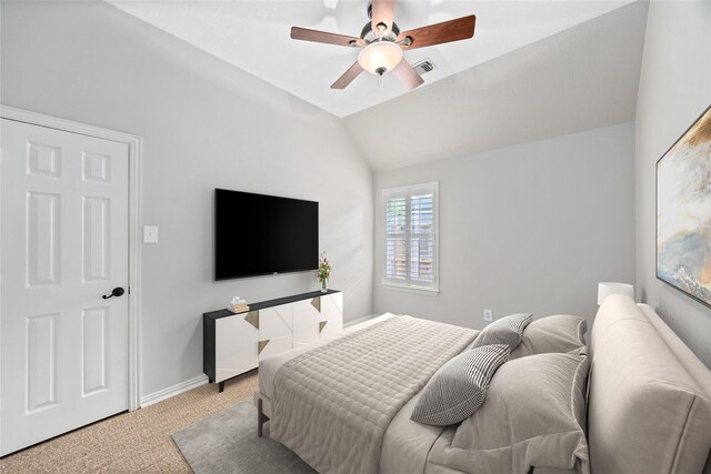 13718 Sherburn Manor Dr, Cypress, TX 77429 - bedroom featuring light colored carpet, vaulted ceiling, and ceiling fan
