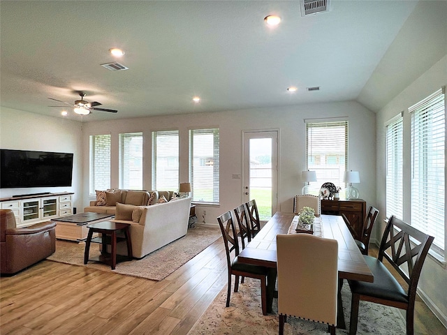 19022 Palizzi Ridge Ln, New Caney, TX 77357 - dining room featuring plenty of natural light, light wood finished floors, ceiling fan, recessed lighting, and vaulted ceiling