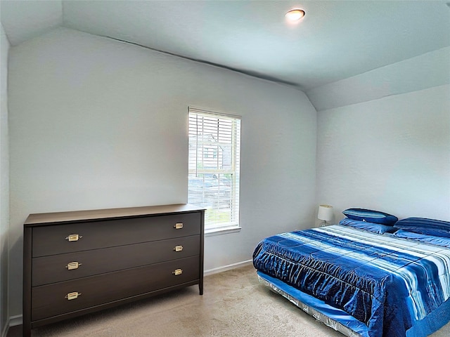 19022 Palizzi Ridge Ln, New Caney, TX 77357 - bedroom with lofted ceiling and light carpet