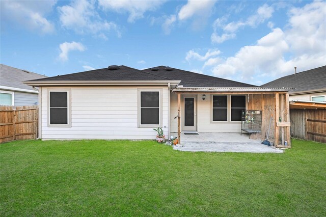 11642 Bodark Valley Ln, Houston, TX 77038 - rear view of house featuring a patio, a fenced backyard, and a shingled roof