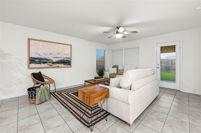 11642 Bodark Valley Ln, Houston, TX 77038 - living room with healthy amount of natural light, ceiling fan, and light tile patterned floors
