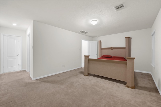 11642 Bodark Valley Ln, Houston, TX 77038 - bedroom with carpet flooring and a textured ceiling
