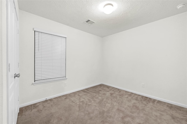 11642 Bodark Valley Ln, Houston, TX 77038 - unfurnished room with carpet and a textured ceiling