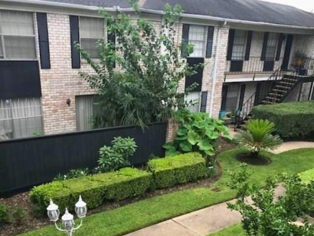 7900 Westheimer Rd Unit 112, Houston, TX 77063 - view of property featuring stairway