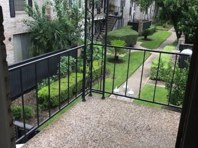 7900 Westheimer Rd Unit 112, Houston, TX 77063 - balcony with stairs