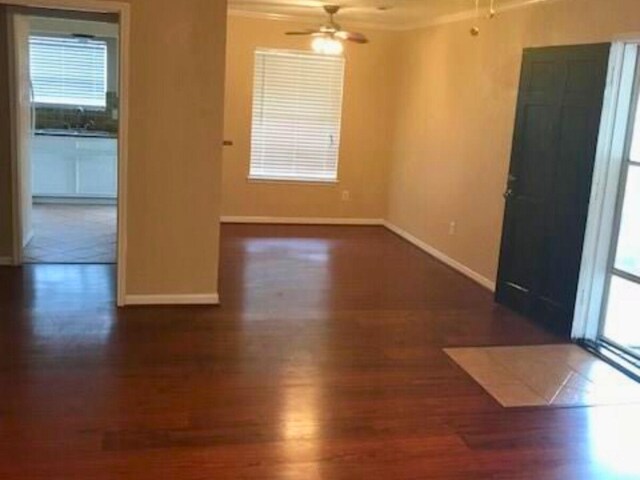 7900 Westheimer Rd Unit 112, Houston, TX 77063 - unfurnished room featuring wood finished floors, ceiling fan, and crown molding