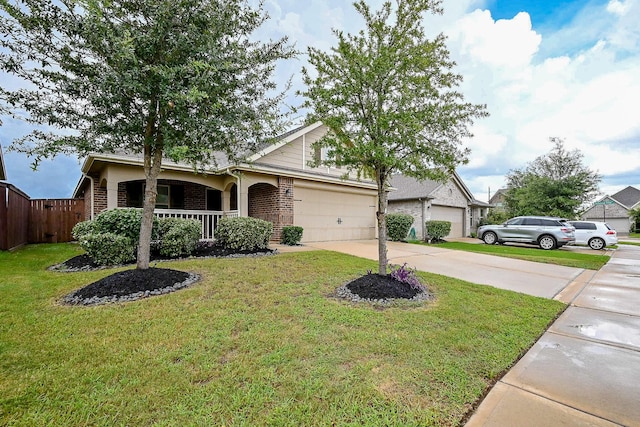 23014 Indigo Prairie Ln, Katy, TX 77493 - view of front of home featuring brick siding, concrete driveway, and a garage