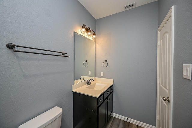 23014 Indigo Prairie Ln, Katy, TX 77493 - bathroom featuring vanity and wood finished floors