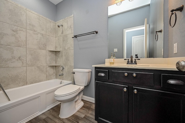 23014 Indigo Prairie Ln, Katy, TX 77493 - full bathroom featuring vanity, wood finished floors, and shower / bath combination