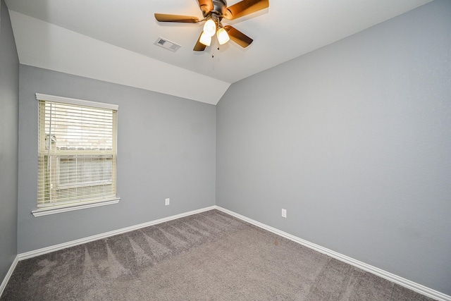 23014 Indigo Prairie Ln, Katy, TX 77493 - empty room featuring a ceiling fan, carpet flooring, and vaulted ceiling