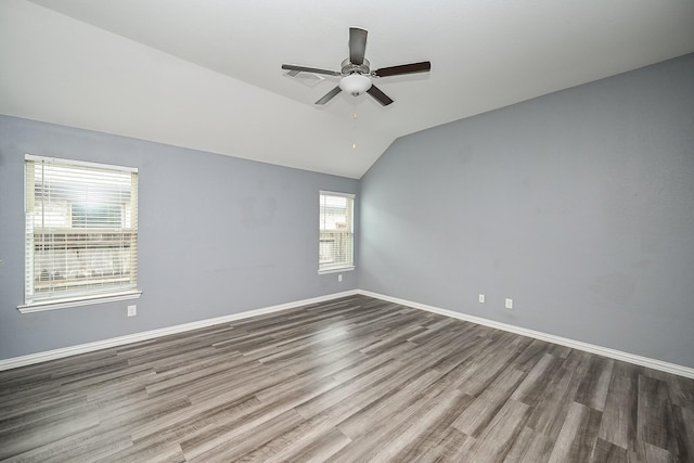 23014 Indigo Prairie Ln, Katy, TX 77493 - empty room featuring wood finished floors, a ceiling fan, and lofted ceiling