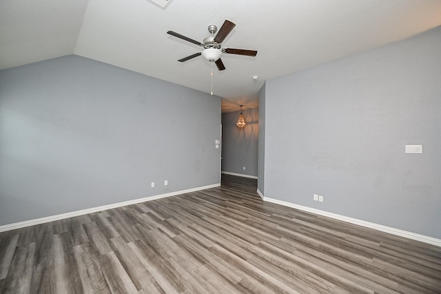 23014 Indigo Prairie Ln, Katy, TX 77493 - spare room with wood finished floors, a ceiling fan, and lofted ceiling