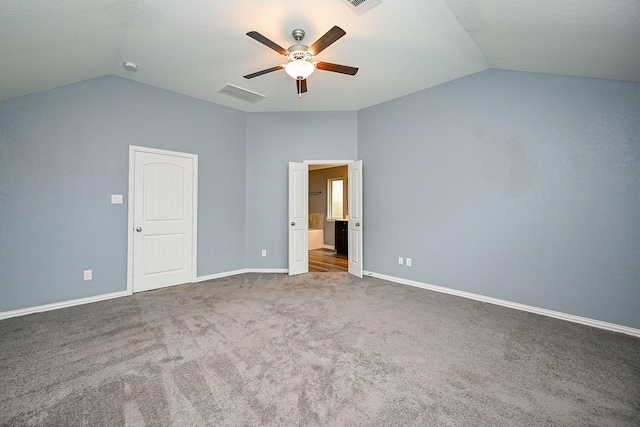 23014 Indigo Prairie Ln, Katy, TX 77493 - unfurnished bedroom with lofted ceiling, carpet flooring, ceiling fan, and connected bathroom