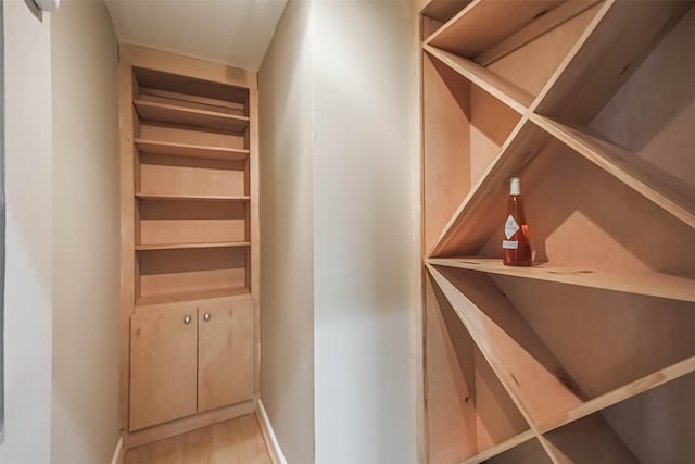 15 Greenway Plz Unit 5C, Houston, TX 77046 - wine cellar featuring baseboards and light wood-style floors