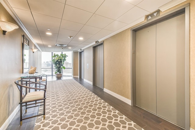 15 Greenway Plz Unit 5C, Houston, TX 77046 - corridor with elevator, wood finished floors, and recessed lighting