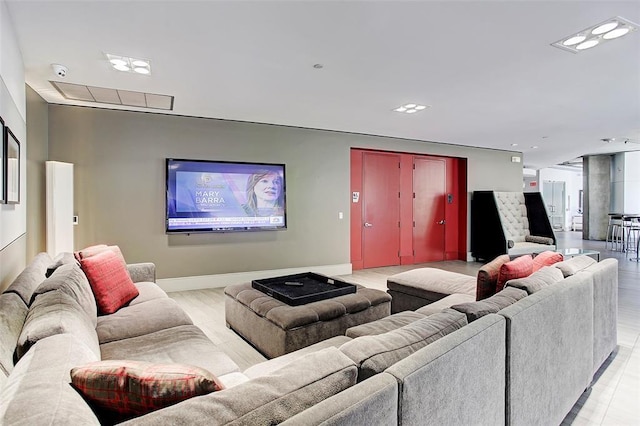 1901 Post Oak Unit 302, Houston, TX 77056 - living area with light wood-type flooring and recessed lighting