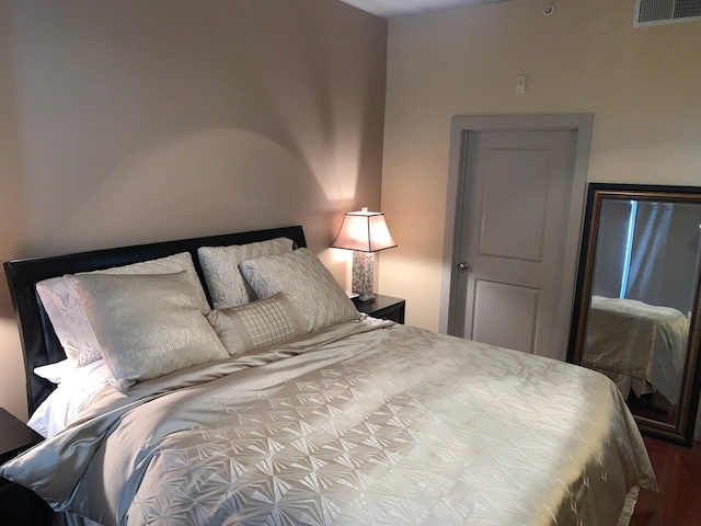 1901 Post Oak Unit 302, Houston, TX 77056 - bedroom featuring wood finished floors