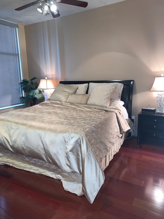 1901 Post Oak Unit 302, Houston, TX 77056 - bedroom with wood-type flooring and a ceiling fan