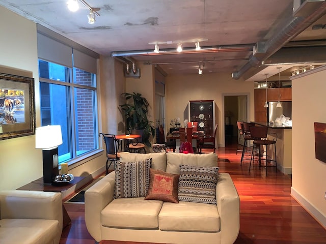 1901 Post Oak Unit 302, Houston, TX 77056 - living area featuring rail lighting and wood finished floors