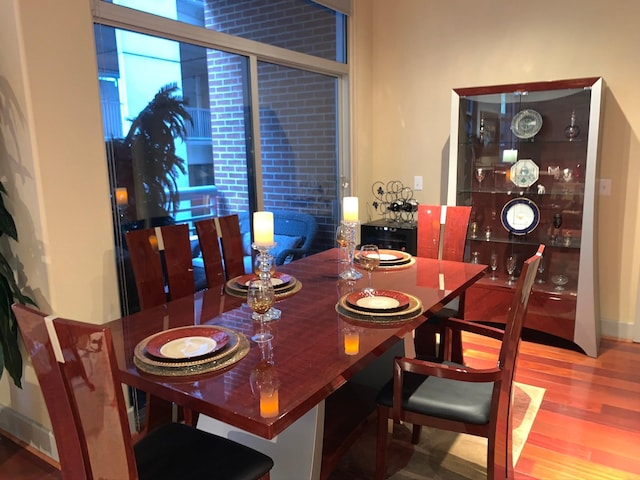 1901 Post Oak Unit 302, Houston, TX 77056 - dining space with wood finished floors