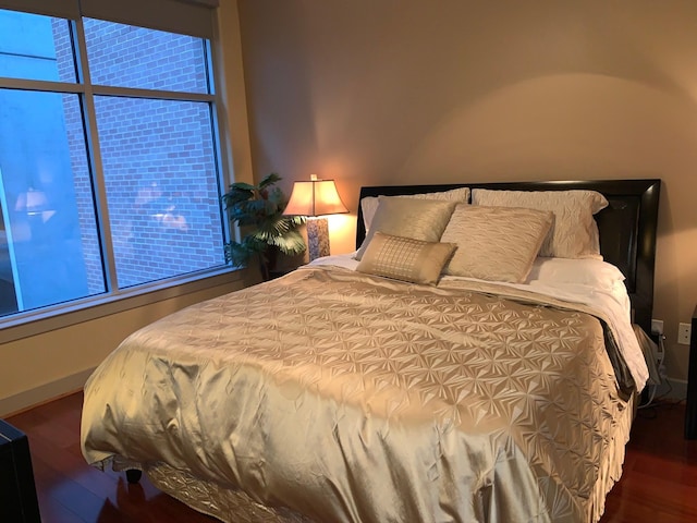 1901 Post Oak Unit 302, Houston, TX 77056 - bedroom featuring wood finished floors