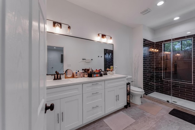 727 E 40th St, Houston, TX 77022 - bathroom featuring double vanity, a shower stall, and recessed lighting