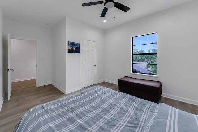 727 E 40th St, Houston, TX 77022 - bedroom with wood finished floors, a ceiling fan, and recessed lighting