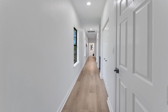 727 E 40th St, Houston, TX 77022 - hall featuring light wood-style floors and recessed lighting