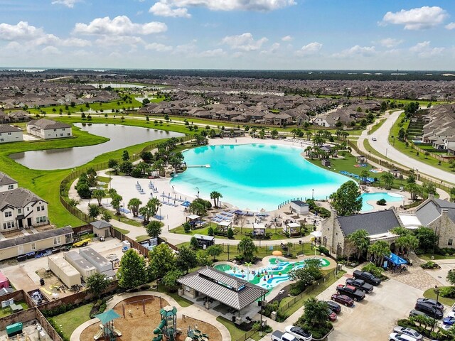 12519 Crathie Dr, Humble, TX 77346 - aerial overview of property's location with a large body of water and nearby suburban area