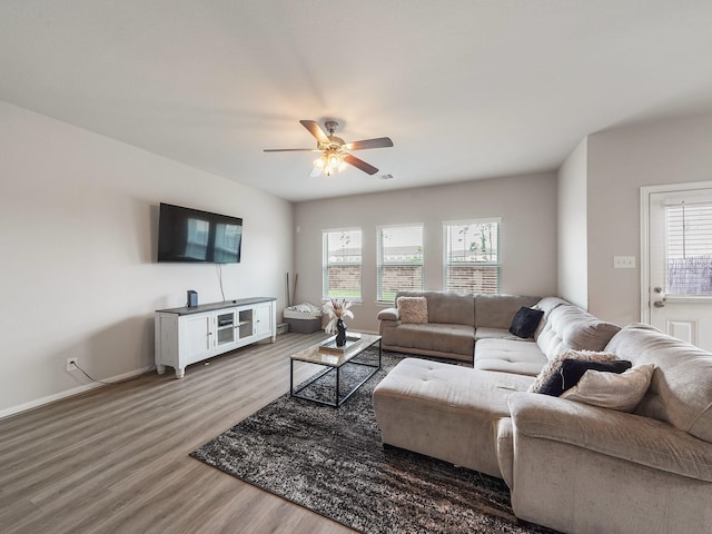 12519 Crathie Dr, Humble, TX 77346 - living area featuring light wood-type flooring and a ceiling fan