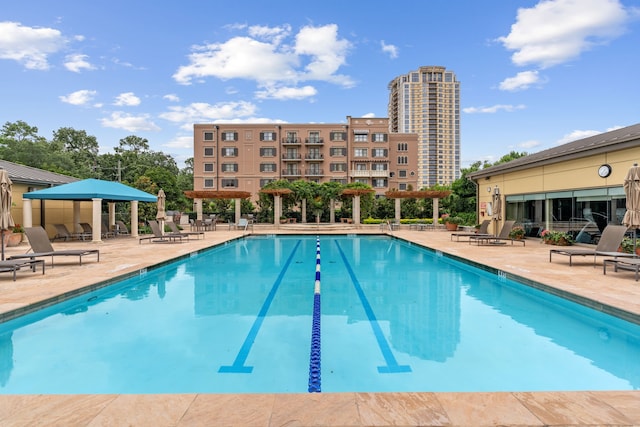 1100 Uptown Park Blvd Unit 23, Houston, TX 77056 - community pool with a patio area