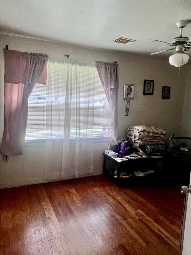 1410 Caplin St, Houston, TX 77022 - dining room featuring wood-type flooring and ceiling fan
