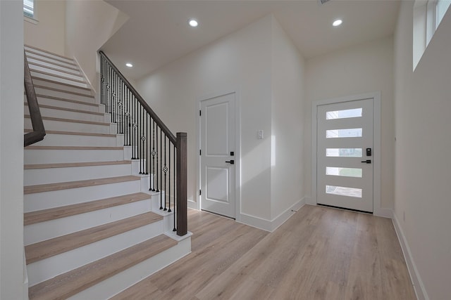2420 Dalview St, Houston, TX 77091 - foyer featuring wood finished floors, plenty of natural light, stairs, and recessed lighting