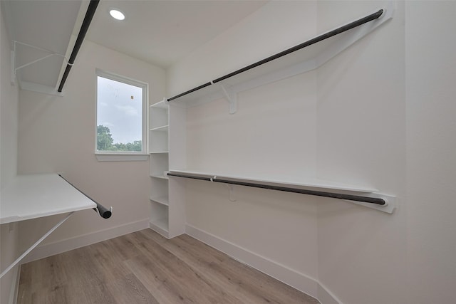 2420 Dalview St, Houston, TX 77091 - walk in closet featuring wood finished floors