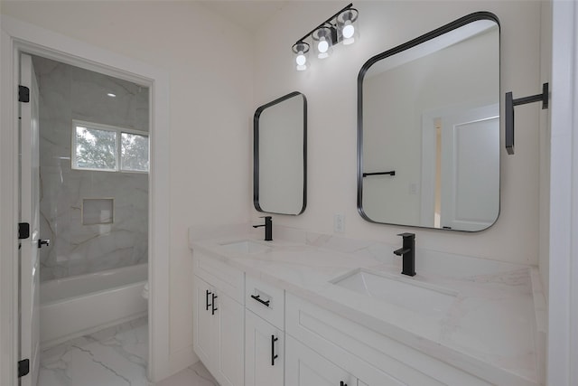 2420 Dalview St, Houston, TX 77091 - bathroom featuring double vanity, marble look tiles, and washtub / shower combination