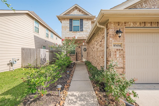 10434 Lake Of The Ozarks Dr, Humble, TX 77396 - view of exterior entry with brick siding