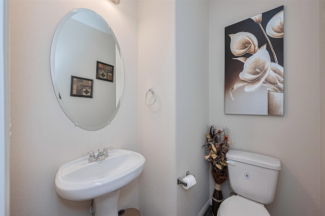 10434 Lake Of The Ozarks Dr, Humble, TX 77396 - bathroom featuring a sink and toilet