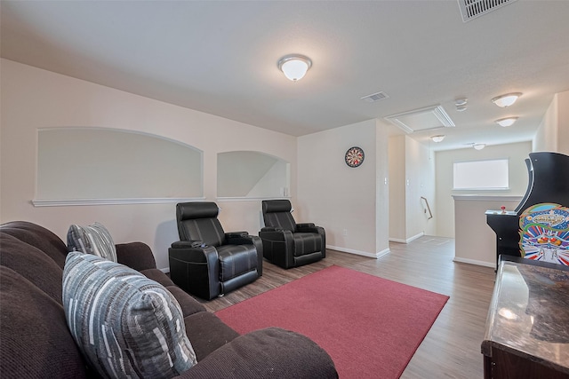 10434 Lake Of The Ozarks Dr, Humble, TX 77396 - living room featuring wood finished floors and baseboards