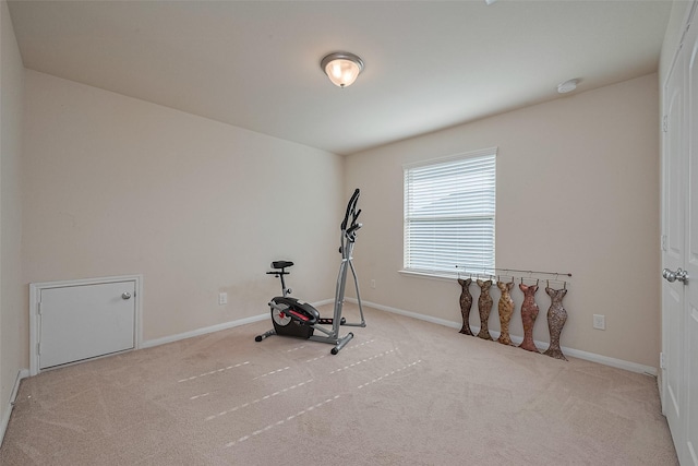 10434 Lake Of The Ozarks Dr, Humble, TX 77396 - exercise area featuring carpet and baseboards