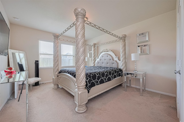 10434 Lake Of The Ozarks Dr, Humble, TX 77396 - carpeted bedroom with baseboards