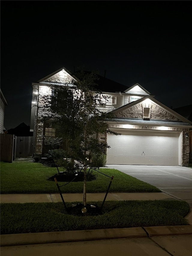 10434 Lake Of The Ozarks Dr, Humble, TX 77396 - view of front of house with stone siding and driveway