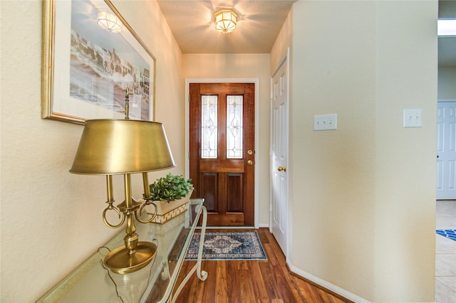 19238 Ashford Square St, Tomball, TX 77375 - entryway featuring wood finished floors and baseboards