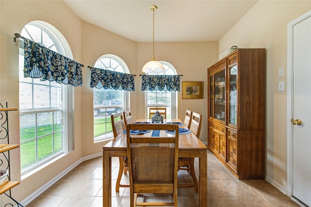 19238 Ashford Square St, Tomball, TX 77375 - dining area with baseboards and light tile patterned floors