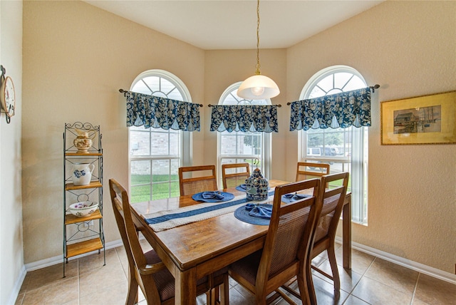 19238 Ashford Square St, Tomball, TX 77375 - dining room with light tile patterned floors and a textured wall