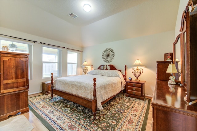 19238 Ashford Square St, Tomball, TX 77375 - bedroom with lofted ceiling and light wood finished floors