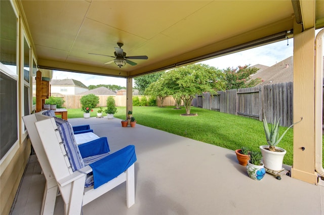 19238 Ashford Square St, Tomball, TX 77375 - fenced backyard featuring a patio area and a ceiling fan