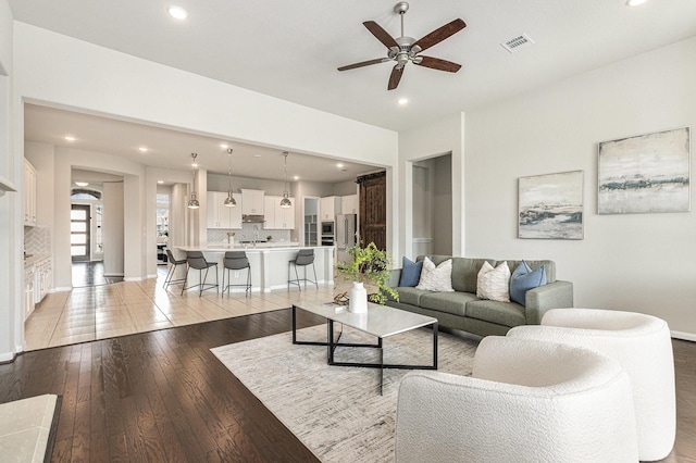 13603 Sandford Meadow Ln, Cypress, TX 77429 - living room with a ceiling fan, recessed lighting, and light wood-style flooring
