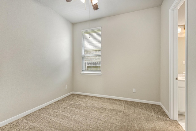 13603 Sandford Meadow Ln, Cypress, TX 77429 - spare room featuring light colored carpet and ceiling fan