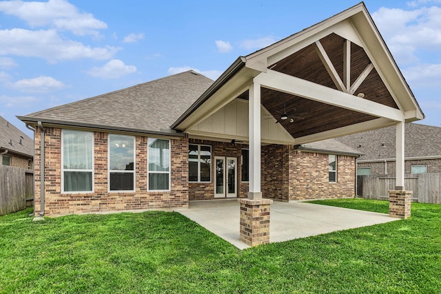 13603 Sandford Meadow Ln, Cypress, TX 77429 - rear view of house with a ceiling fan, roof with shingles, a patio area, and brick siding