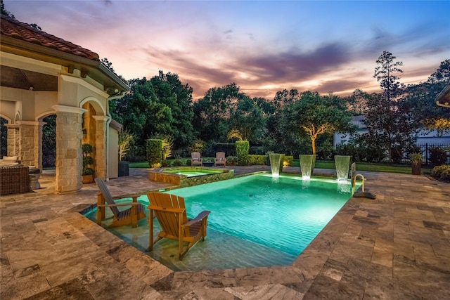 27 S Glenwild Cir, The Woodlands, TX 77389 - view of pool with a patio and a pool with connected hot tub